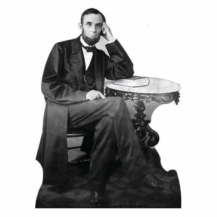 Abraham Lincoln Sitting At Table Cardboard Cutout